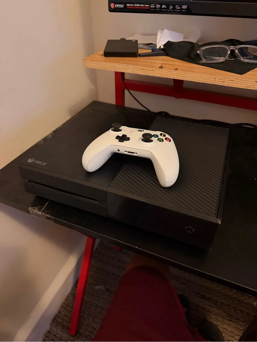 Microsoft Xbox One black console with white wireless controller